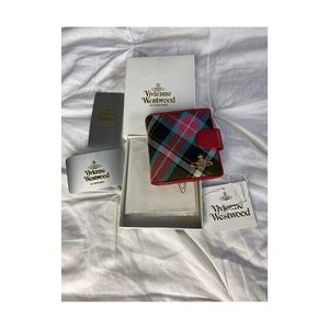 Vintage Vivienne Westwood tartan plaid wallet with snap closure.